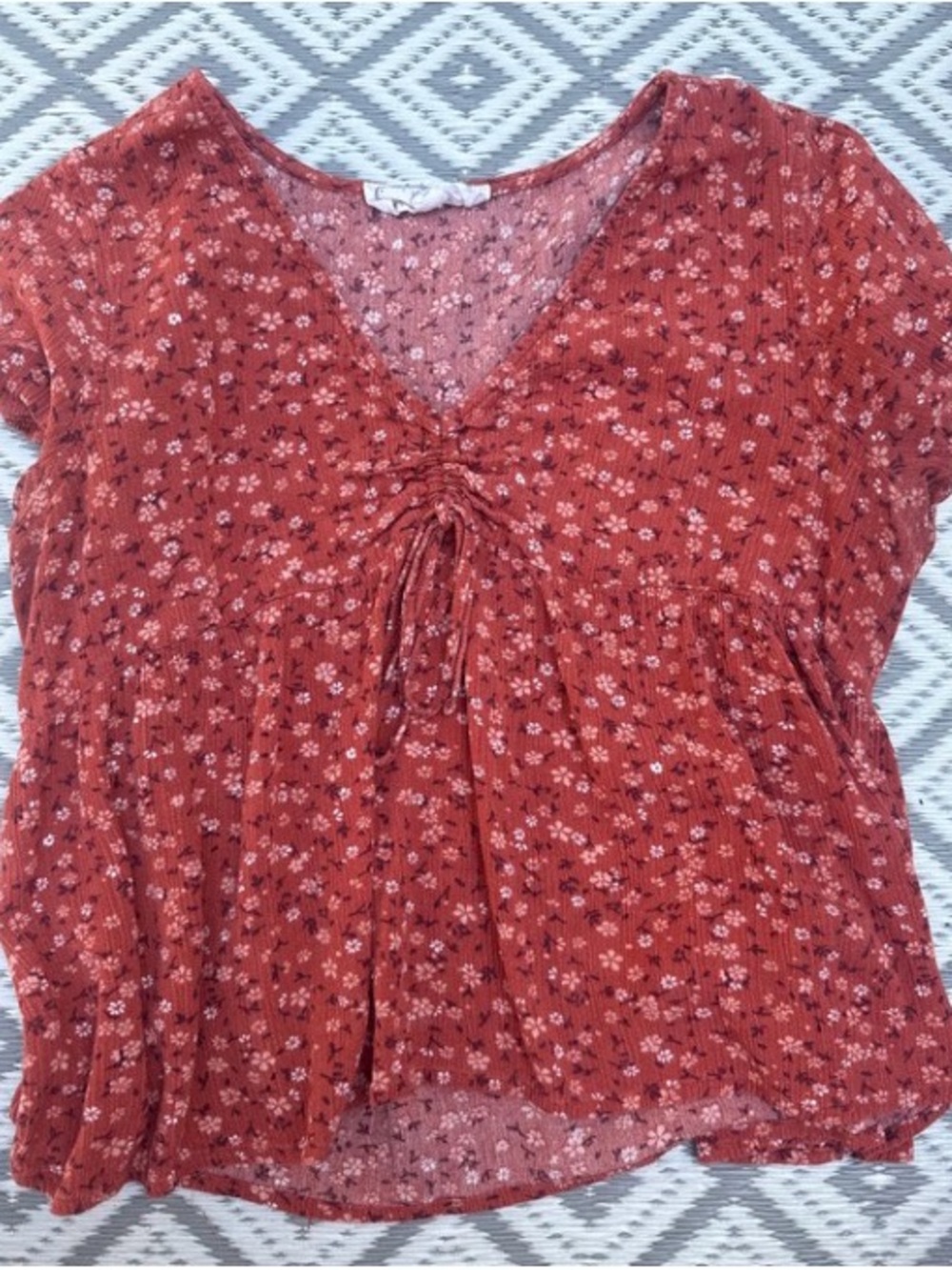 Women’s Rust Floral Drawstring V-Neck Top